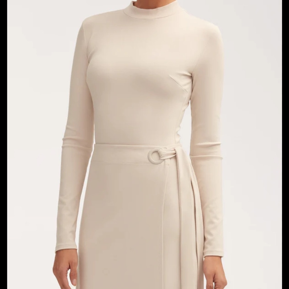 Brand new veiled dress in stone.